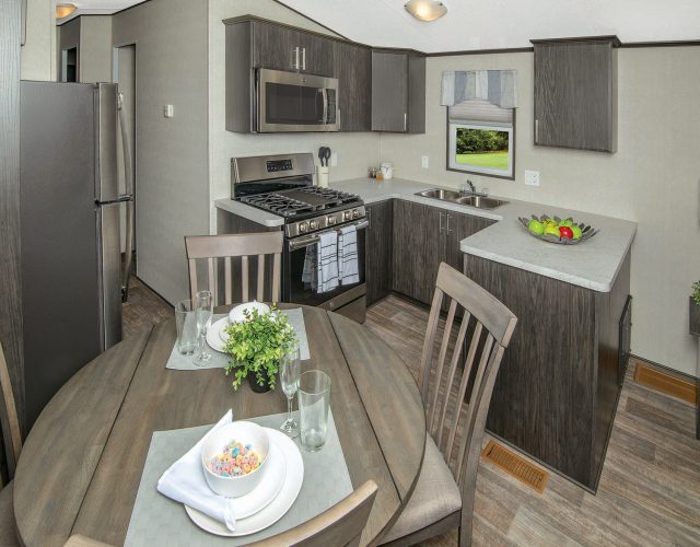 Northlander Reflection Park Model Cottage | Kitchen with Dining Table
